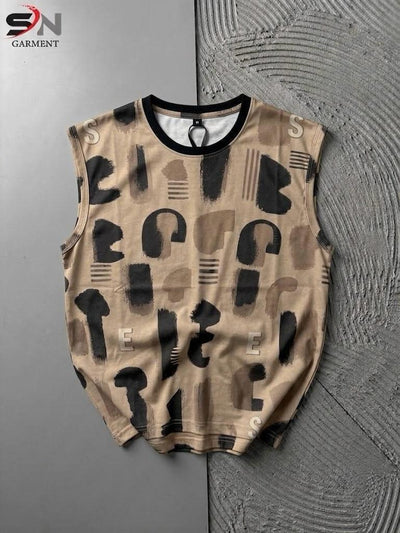 Beige sleeveless shirt with black geometric pattern on a textured gray surface