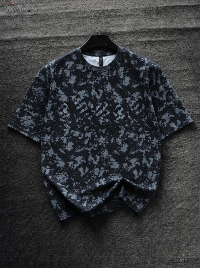 Men's black oversized abstract camouflage print T-shirt, premium crew neck streetwear tee with relaxed fit for casual everyday fashion by HUMRAAZ.