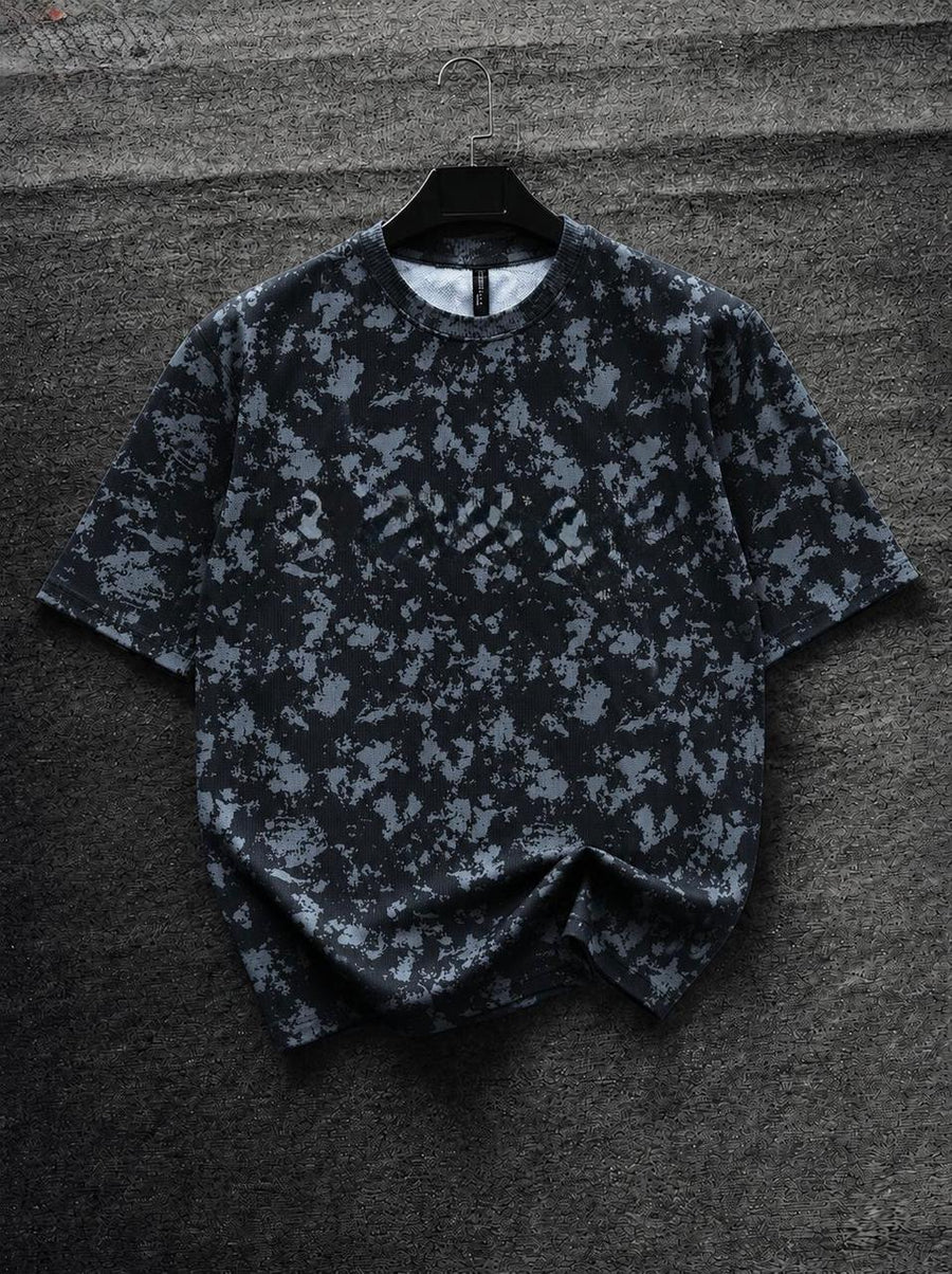Men's black oversized abstract camouflage print T-shirt, premium crew neck streetwear tee with relaxed fit for casual everyday fashion by HUMRAAZ.